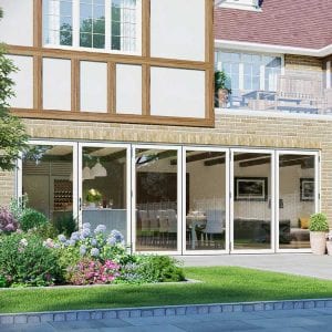 Bi fold doors out into a neat patio and garden