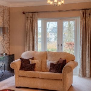 White french doors in a cosy living room